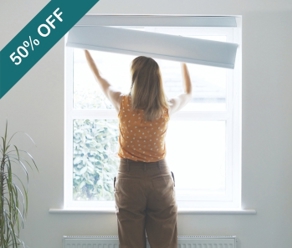 Woman Installing Grip Fit Blind 50 Percent Off